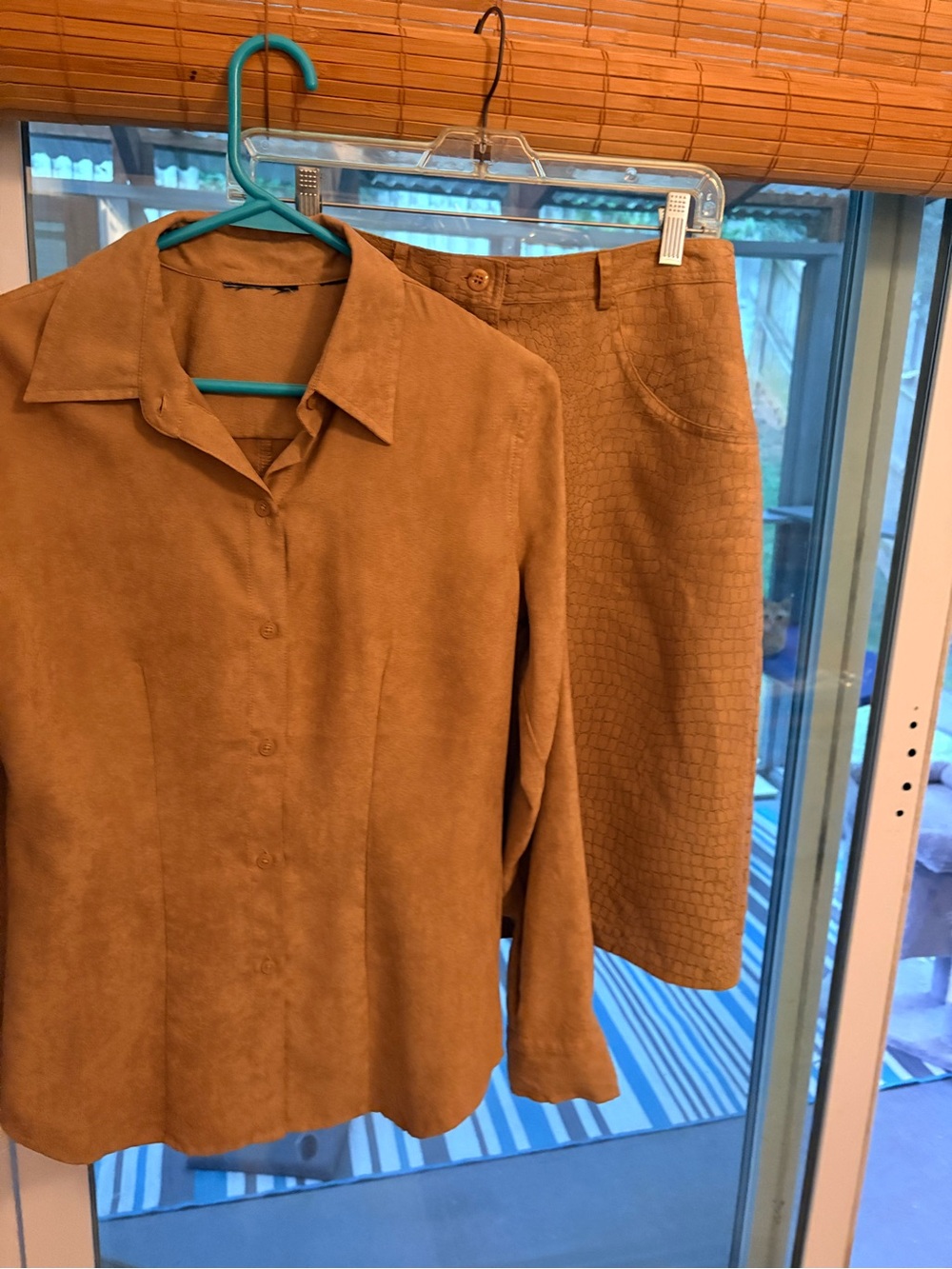 Women's camel color faux Suede Button-Up shirt and skirt set.
